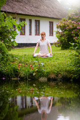 Lotus pose, meditation and zen with woman outdoor for peace exercise, mindfulness and spirituality. Mental health, healing aura and yoga with person in nature for holistic, awareness and calm