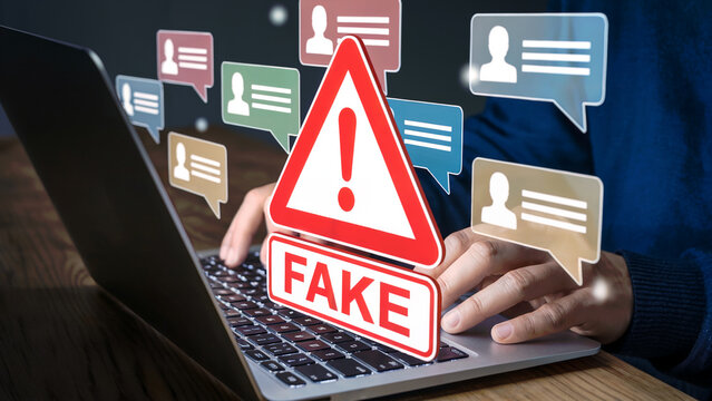 Combating fake news with online literacy and critical thinking skills using a laptop to identify disinformation in digital communication streams - Powered by Adobe