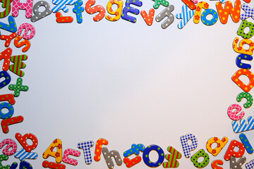 Magnetic Alphabet Letter Frame on Whiteboard with Copy Space