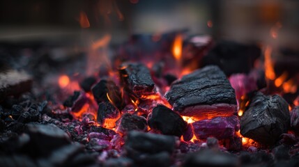 Glowing embers of a hot barbecue fire
