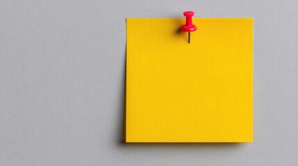 Pinning a yellow sticky note on a transparent standard surface office environment visual concept for organization