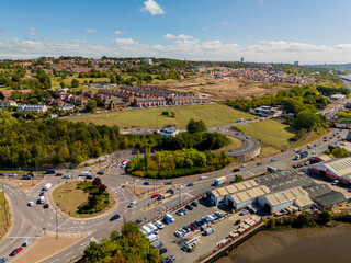 Newcastle upon Tyne UK: 15th Aug 2025: Scotswood roundabout with Elswick in background on a clear day showing traffic and construction activity