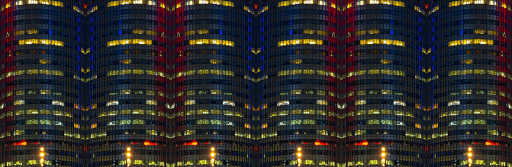Multi-stories office building at night with worker working overtime. late night at office. lighting and working people within