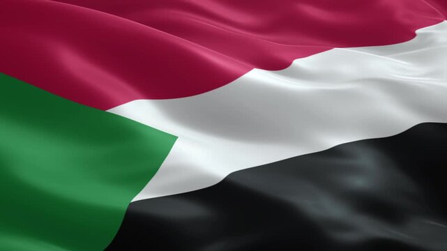 Dynamic waving flag of Sudan creating a vibrant national symbol, perfect for news, travel, or cultural contexts, bringing a touch of global awareness
