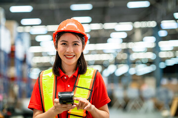 A woman wearing a safety vest and a hard hat is smiling