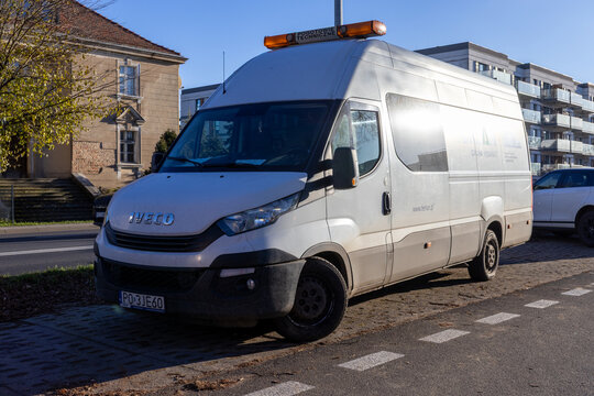 Poznan, Poland - November 21, 2025: Iveco van POGOTOWIE TECHNICZNE GRUPA AQUANET, critical public utility service vehicle, parked on urban street