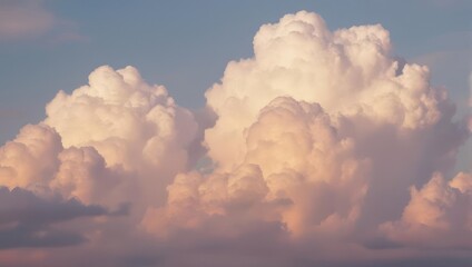Majestic fluffy clouds illuminated by the warm sunlight in the sky.