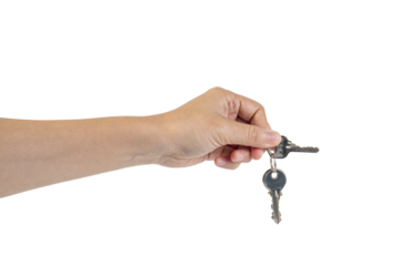 Key with a ring in hand on a transparent background.