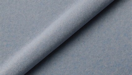 Close-up of a soft, light blue velvet fabric with a subtle sheen and diagonal fold.