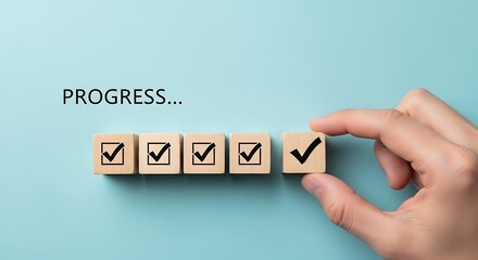 A hand places the final checkmark cube in a row, symbolizing successful completion and goal achievement