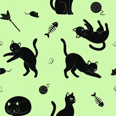 Hand drawn black cats seamless pattern on bright green background 