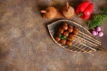 Quail egg satay on a plate