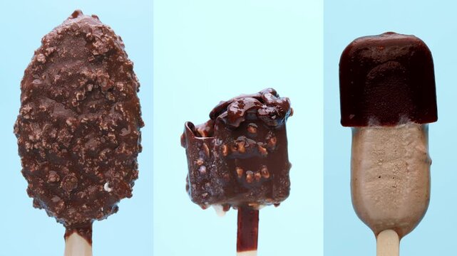 4K footage vertical video trio of colorful ice cream pops strawberry chocolate with drizzle and vanilla stand side by side against bright blue backdrop.
