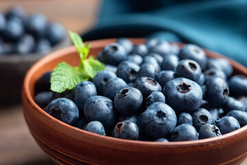 Closeup view blueberries in a bowl. Fresh berries harvest