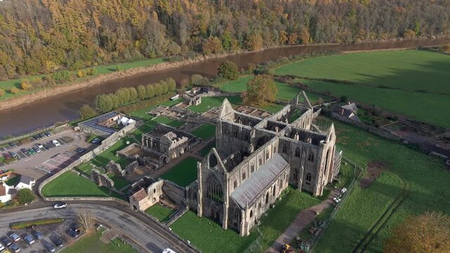 Drone footage flying towards the ancient ruins of Tintern Abbey in the Wye Valley