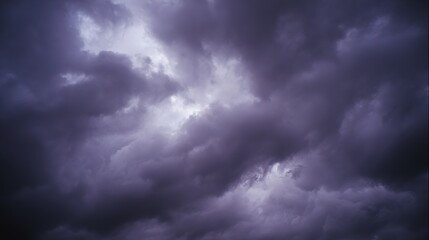 Obraz premium midgard. Dark purple storm clouds gathering before rainfall, dramatic sky formation, natural weather phenomenon. travel magazines, destination branding, designed for travel destination branding.