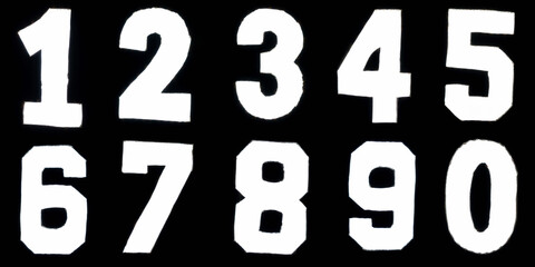 Set of glowing numbers on a black background