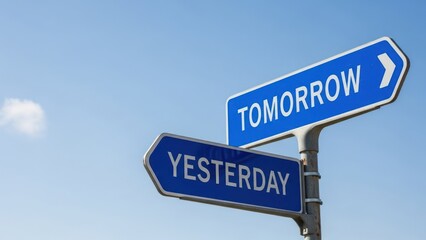 Two blue signs pointing 'Tomorrow' right, 'Yesterday' left, set against a bright sky