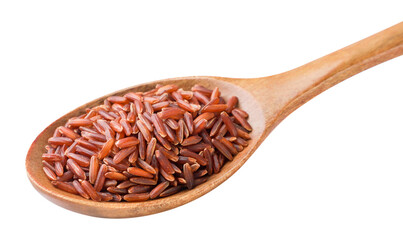 Red rice in a wooden spoon on a white background. Isolated