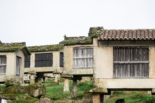 Granite structures for drying corn raised on stone pillars.