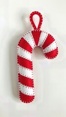Whimsical Felt Candy Cane Ornament Red White Striped Hand Stitched Isolated Playful Christmas Decoration