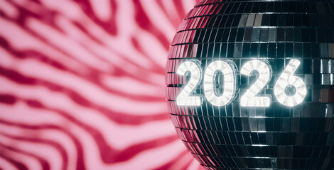 Luminous 2026 text on a mirror disco ball with a blurry pink zebra pattern background, a festive concept for a New Year's Eve celebration or party invitation.