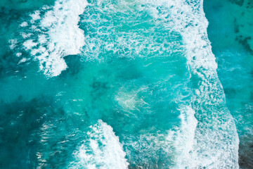 Blue ocean texture with waves and foam. La Digue Island, Seychelles