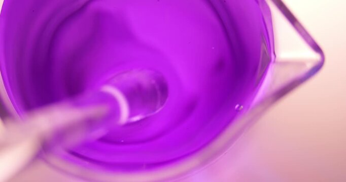 Methyl Violet (C24H28ClN3) Purple Solution in Measuring Glass Beaker, Glass Rod Stirring Undissolved Particles, Chemical Research Process, Scientific Experiment Investigation, Laboratory Discovery