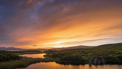 Obraz premium Stunning golden sunset reflecting on calm lake waters, a tranquil landscape scene perfect for travel, nature, and peaceful escape concepts, with dreamy atmosphere