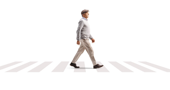 Elderly gentleman walking over zerba crossing
