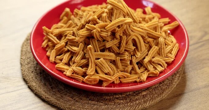 Crispy soya stick snack served in a bowl, healthy high-protein Indian namkeen for tea time or evening munching
