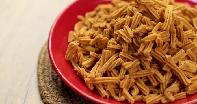 Crispy soya stick snack served in a bowl, healthy high-protein Indian namkeen for tea time or evening munching