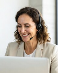 Female executive engaging in video call modern office closeup shot natural lighting authentic expression