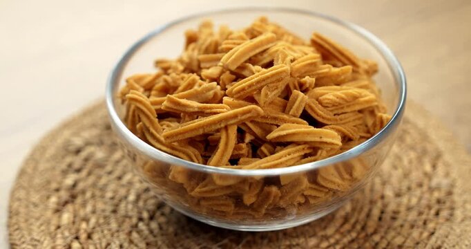 Crispy soya stick snack served in a bowl, healthy high-protein Indian namkeen for tea time or evening munching