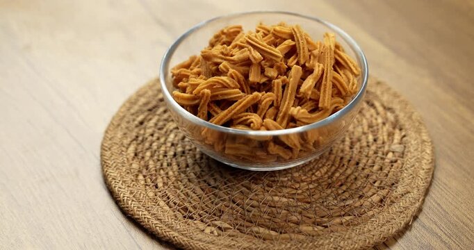 Crispy soya stick snack served in a bowl, healthy high-protein Indian namkeen for tea time or evening munching