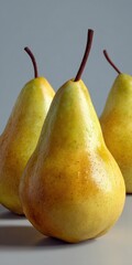 Fresh yellow pears still life with water droplets