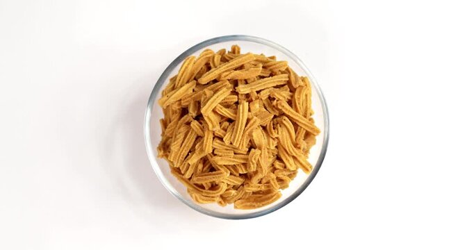 Crispy soya stick snack served in a bowl, healthy high-protein Indian namkeen for tea time or evening munching