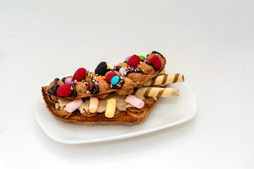Decorated Waffle with Sweets and Berries