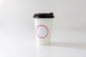 paper coffee cup with lid on white background 