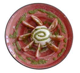 Burrata caprese salad with sliced tomatoes and pesto