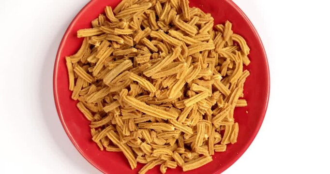 Crispy soya stick snack served in a bowl, healthy high-protein Indian namkeen for tea time or evening munching