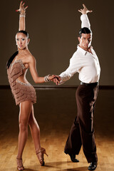 latino dance couple in action - wild samba
