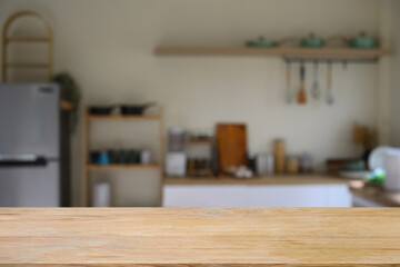 Wood table top on blur kitchen room background, montage table