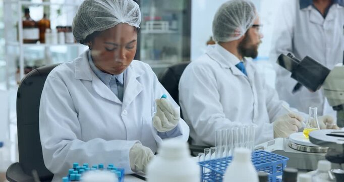 Scientist, woman and blood notes with test tubes for chemistry, testing and medical research. Biotech, laboratory team and writing with DNA inspection for pathology, experiment or microbiology
