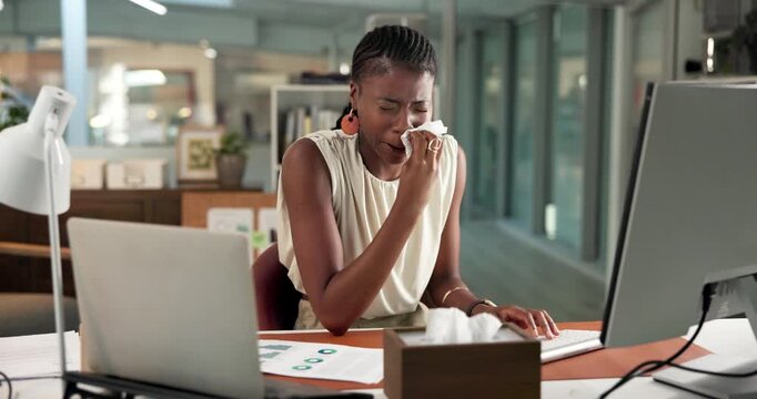 Woman, computer and blowing nose in office with tissue for influenza, sinus infection and data analysis. Sick, black person sneeze and toilet paper with hayfever, virus symptoms or desktop for stats.