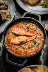 Portuguese traditional food Crab soup risotto meal on restaurant table in lisbon