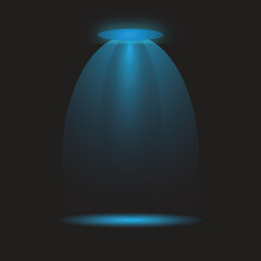 Powerful blue spotlight beam illuminates dark empty stage floor from above.