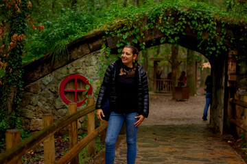 portrait of a  beautiful young man in a park