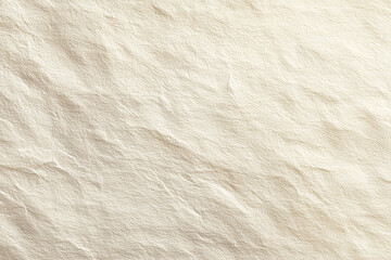 Obraz premium A bright, seamless background texture of paper or card stock in a light peach or beige color