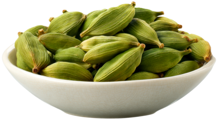 Pile of fresh green cardamom pods in a white cracked bowl, perfect for culinary use and food preparation inspiration